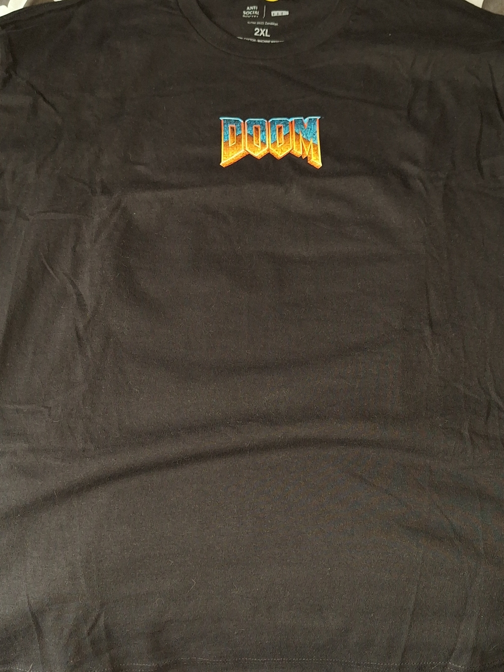 Anti Social Social Club Black T‑Shirt with Blue and Gold DOOM Logo